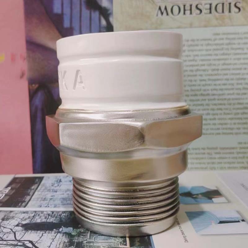 Kūrybiškas žvakės formos puodelis